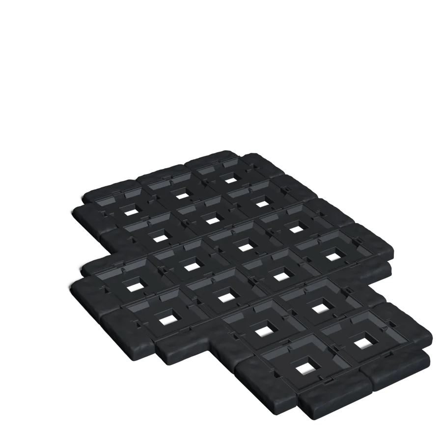 Dark Dynamod tile bases joined into a board with stone edges around the outside